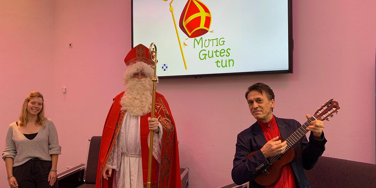 Aktion 'Mutig Gutes tun' – v.l. Meike Frai-Kölner - Jugendwerkzentrum, Norbert Michels - Diözesanrat und Fug - Musiker
