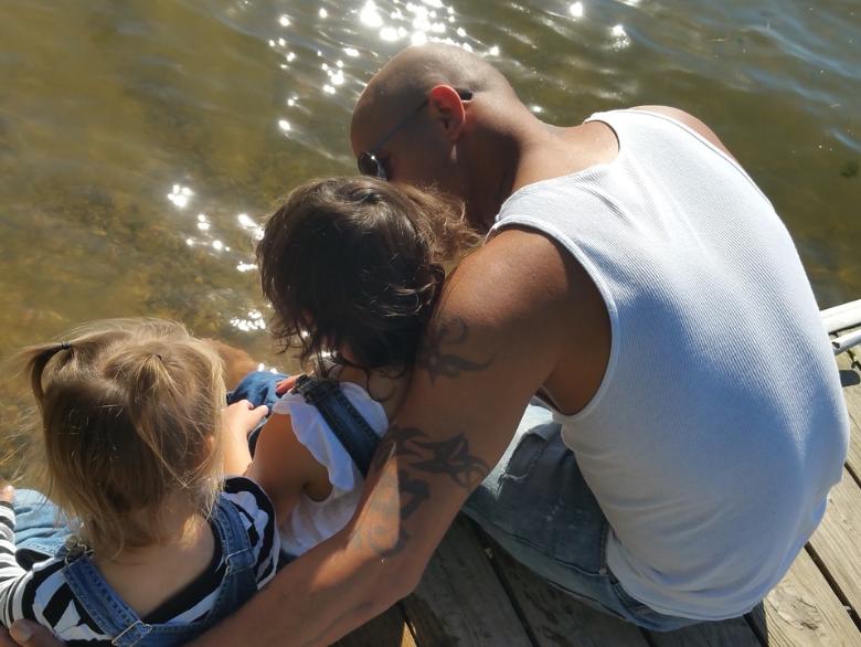 Vater mit Kindern