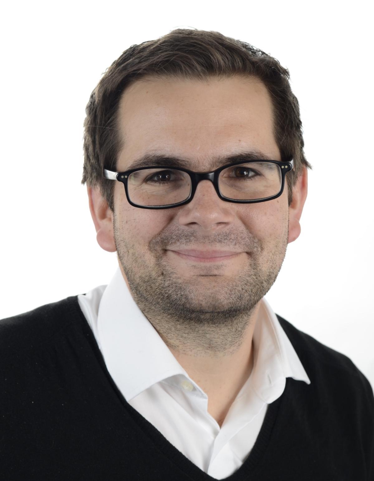 Dr. Dominik Arenz