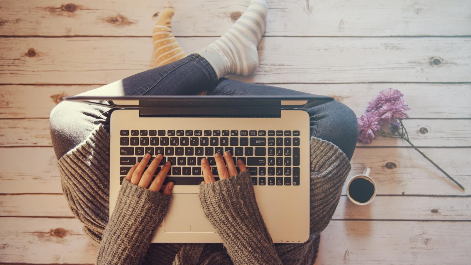 Home office concept: girl working at home