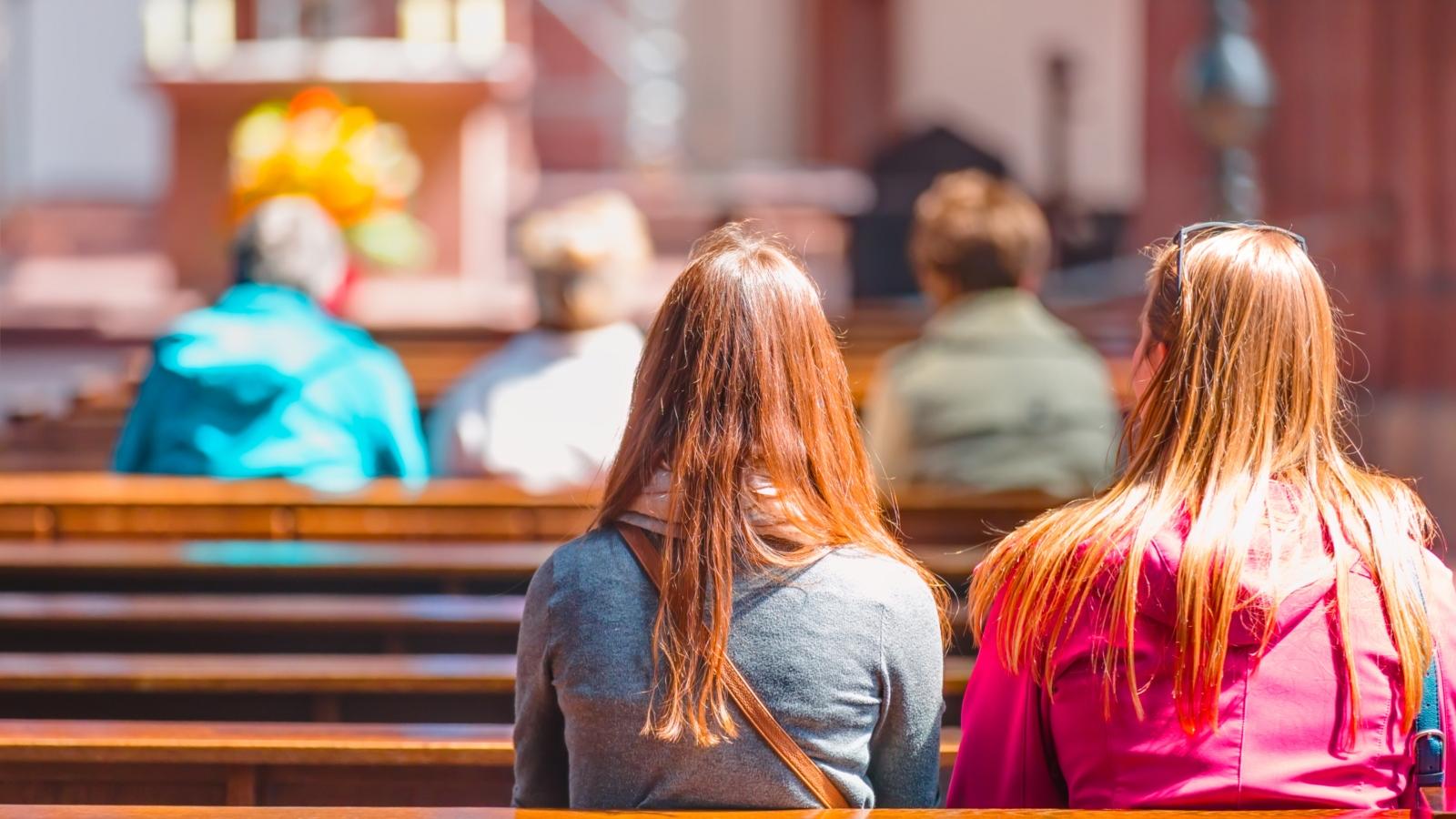 People praying in a church