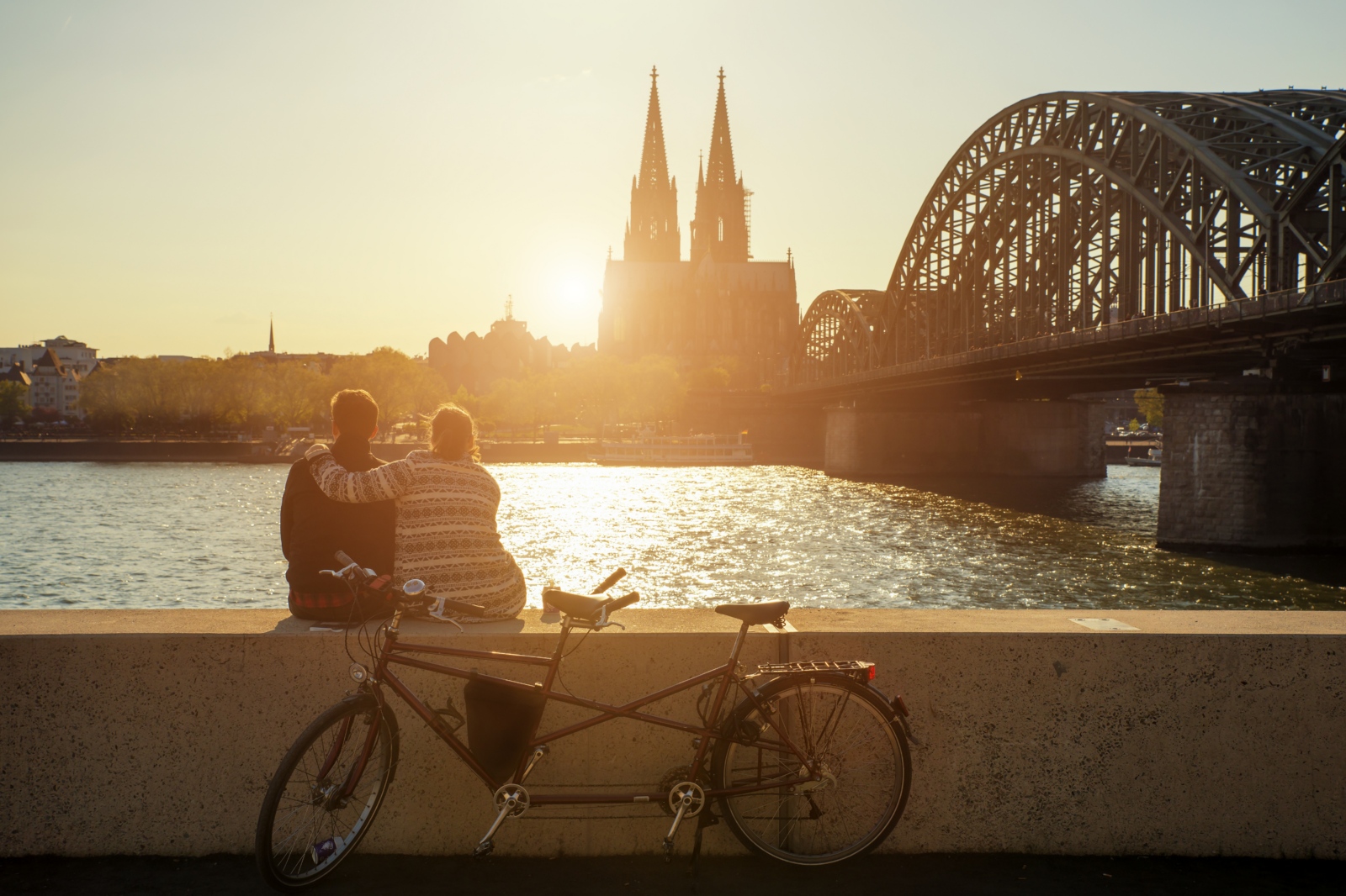 Young romantic couple spending their vacation in Cologne, Germany.